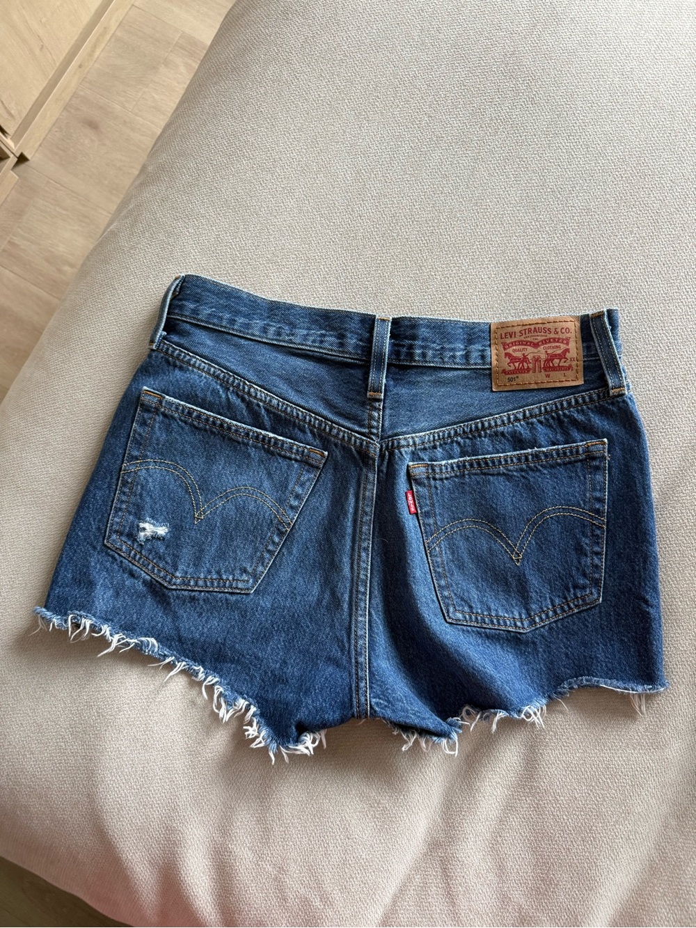 Levi's Women's Blue Denim Cutoff Shorts with Frayed Hem